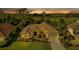 Attractive single-Gathering home with a tile roof and landscaping at 13791 Palmetto Point Ct, Port Charlotte, FL 33953