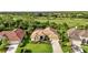 Beautiful single Gathering home with well-manicured lawn and mature landscaping in a golf community at 13791 Palmetto Point Ct, Port Charlotte, FL 33953