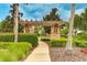 Landscaped walkway with pergola and lush greenery at 5227 Morey Farms Loop, Palmetto, FL 34221