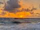 Spectacular sunset over the ocean waves at 769 North Shore Dr, Anna Maria, FL 34216