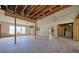 Spacious living room with large windows, currently under renovation at 3123 Webber St, Sarasota, FL 34239