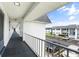 Outdoor balcony walkway with a view of the parking lot at 304 47Th Avenue W Dr # 307, Bradenton, FL 34207