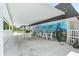 Covered outdoor space with tables and chairs at 304 47Th Avenue W Dr # 307, Bradenton, FL 34207