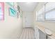 Bright entryway with tile flooring and artwork at 304 47Th Avenue W Dr # 307, Bradenton, FL 34207