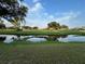 Serene golf course view with a calm water feature at 7461 W Country Club N Dr # 401, Sarasota, FL 34243