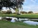 Peaceful view of a golf course and tranquil water at 7461 W Country Club N Dr # 401, Sarasota, FL 34243