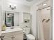 Clean bathroom with shower, toilet, and vanity with storage at 5026 Water Oak Dr # 112, Bradenton, FL 34207