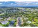 Aerial view of community near the coast, with a lake and pool at 5026 Water Oak Dr # 112, Bradenton, FL 34207