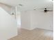 Open living room with high ceilings and ceiling fans at 6209 Flagfish Ct, Lakewood Ranch, FL 34202