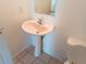 Bathroom with pedestal sink and toilet at 6209 Flagfish Ct, Lakewood Ranch, FL 34202