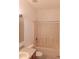 Clean bathroom with tub shower and wood vanity at 6209 Flagfish Ct, Lakewood Ranch, FL 34202