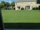 Spacious backyard with grassy area at 6209 Flagfish Ct, Lakewood Ranch, FL 34202