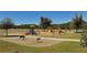 playground with swings, slides, and play structures at 6209 Flagfish Ct, Lakewood Ranch, FL 34202