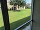 View of backyard from screened porch at 6209 Flagfish Ct, Lakewood Ranch, FL 34202