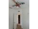 Bedroom with baseball bat ceiling fan and an ensuite bathroom at 6209 Flagfish Ct, Lakewood Ranch, FL 34202