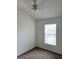 Bright bedroom with ceiling fan and window at 6209 Flagfish Ct, Lakewood Ranch, FL 34202