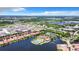 Aerial view of community near lake and other amenities at 126 Porta Vecchio Bnd # 202, North Venice, FL 34275