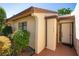 Exterior view of villa with manicured landscaping at 4740 Marsh Field Rd # 6, Sarasota, FL 34235