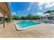 Community pool with plenty of lounge chairs at 2812 72Nd Street W Ct # Blg 27, Bradenton, FL 34209