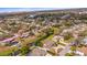 Expansive aerial view shows waterfront homes, lush greenery, and serene canals in a desirable neighborhood at 2232 River Ridge Dr, Sarasota, FL 34239