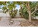 Private backyard with brick pavers and lush landscaping, great for entertaining at 2232 River Ridge Dr, Sarasota, FL 34239