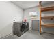 Laundry room equipped with modern washer and dryer, offering convenience at 2232 River Ridge Dr, Sarasota, FL 34239