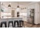 Modern kitchen with white shaker cabinets and stainless steel appliances at 1200 Via Tripoli, Punta Gorda, FL 33950