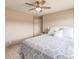 Spacious bedroom with a king-size bed and ceiling fan at 1200 Via Tripoli, Punta Gorda, FL 33950