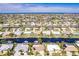 Wide aerial view of waterfront home and community at 1200 Via Tripoli, Punta Gorda, FL 33950