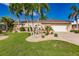 Single story home with two-car garage, nicely landscaped lawn at 1200 Via Tripoli, Punta Gorda, FL 33950