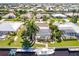 Aerial view of waterfront home with pool and boat at 1200 Via Tripoli, Punta Gorda, FL 33950