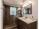 Clean bathroom with walk-in shower and vanity at 1200 Via Tripoli, Punta Gorda, FL 33950