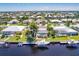 Aerial view of waterfront home with pool and boat at 1200 Via Tripoli, Punta Gorda, FL 33950