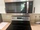 Stainless steel stove and microwave at 4102 Central Sarasota Pkwy # 922, Sarasota, FL 34238