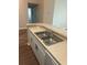 Kitchen features a double sink and modern appliances at 4102 Central Sarasota Pkwy # 922, Sarasota, FL 34238