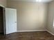 Bedroom with wood-look floors and ceiling fan at 4102 Central Sarasota Pkwy # 922, Sarasota, FL 34238
