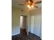 Bedroom with wood-look floors and access to bathroom and closet at 4102 Central Sarasota Pkwy # 922, Sarasota, FL 34238