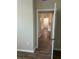 Condo hallway with new flooring and neutral walls at 4102 Central Sarasota Pkwy # 922, Sarasota, FL 34238