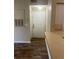 Condo entryway with new flooring and neutral walls at 4102 Central Sarasota Pkwy # 922, Sarasota, FL 34238