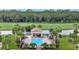 Community pool with surrounding patio and lush landscaping at 17724 Gawthrop Dr # 201, Bradenton, FL 34211