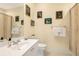 Simple bathroom with toilet, sink and shower at 7676 Bergamo Ave, Sarasota, FL 34238