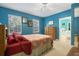 Bedroom with a double bed, built in dresser and en-suite bathroom at 7676 Bergamo Ave, Sarasota, FL 34238