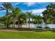 Peaceful gazebo overlooking a serene lake at 7676 Bergamo Ave, Sarasota, FL 34238