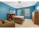 Bright bedroom with double bed, and ample closet space at 7676 Bergamo Ave, Sarasota, FL 34238