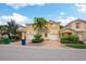 Beautiful townhome with 2-car garage and lush landscaping at 7676 Bergamo Ave, Sarasota, FL 34238