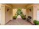Brick paved pathway leads to a courtyard between two townhouses at 7676 Bergamo Ave, Sarasota, FL 34238