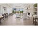 Elegant community room with fireplace, seating area, and large windows at 7676 Bergamo Ave, Sarasota, FL 34238