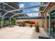 Screened in patio with storage and kayaks at 7676 Bergamo Ave, Sarasota, FL 34238