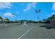 Enjoy resort-style living with well-maintained tennis courts at 7676 Bergamo Ave, Sarasota, FL 34238