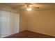 Bedroom with carpet flooring and sliding glass doors at 4210 66Th Street W Cir, Bradenton, FL 34209